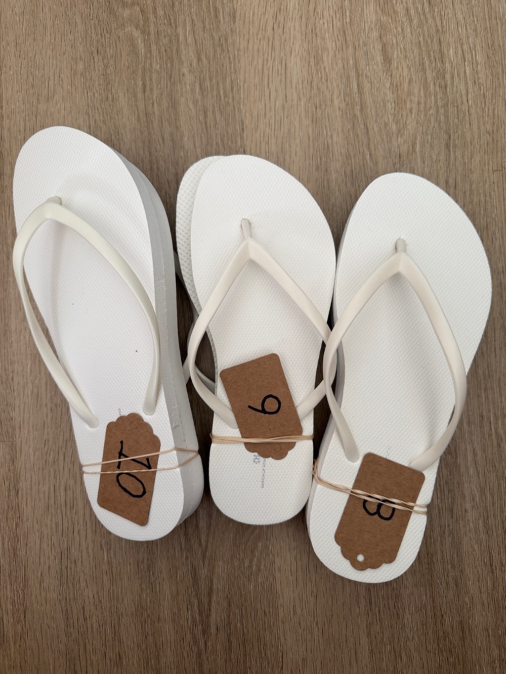18 pairs of Old Navy White Women's Flip Sandals (never worn)